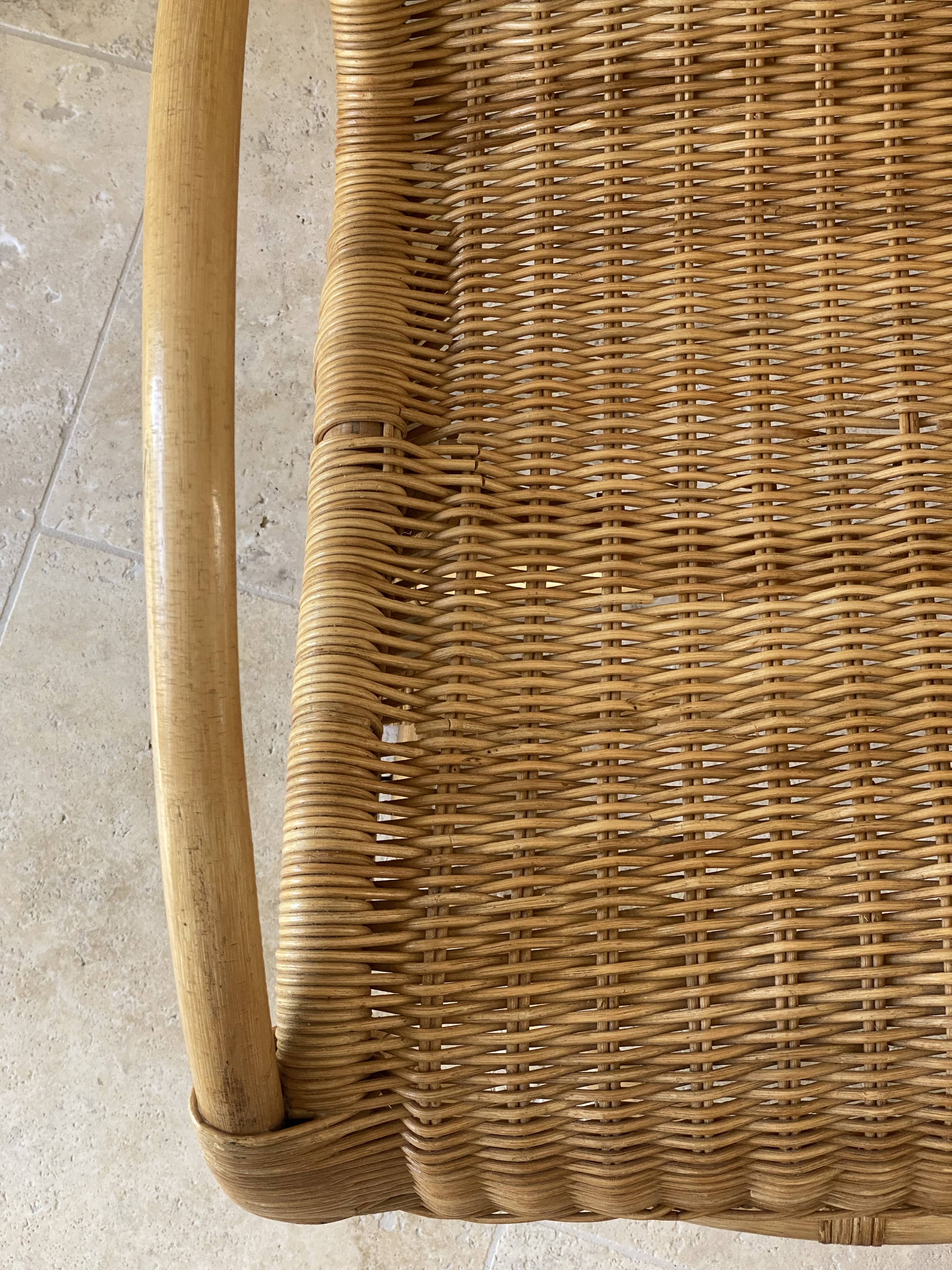 Natural rattan rocking chair.