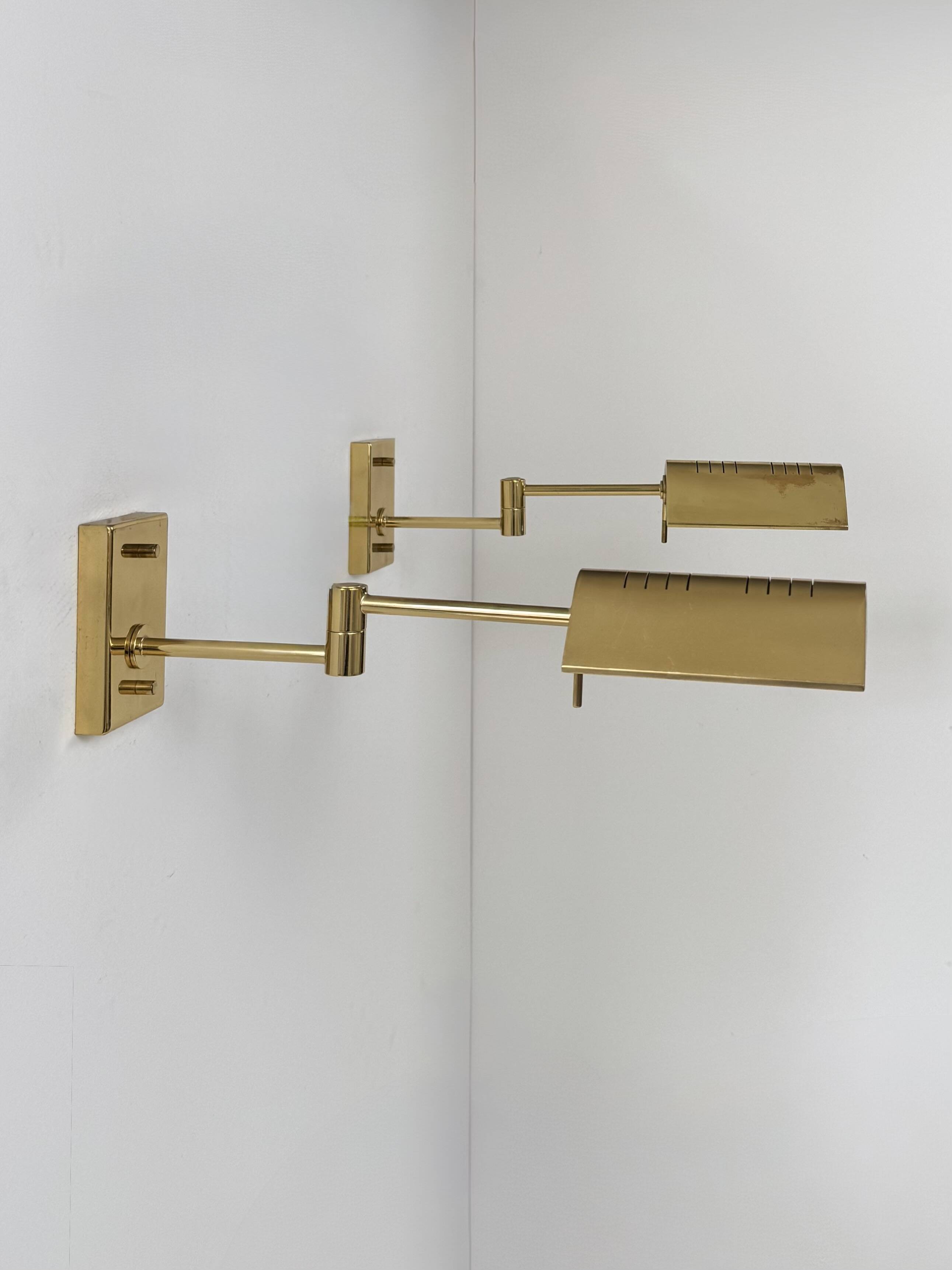 Pair of adjustable vintage wall lights, brass, France, 1970.