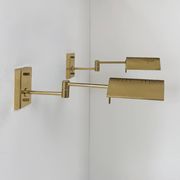 Pair of adjustable vintage wall lights, brass, France, 1970.