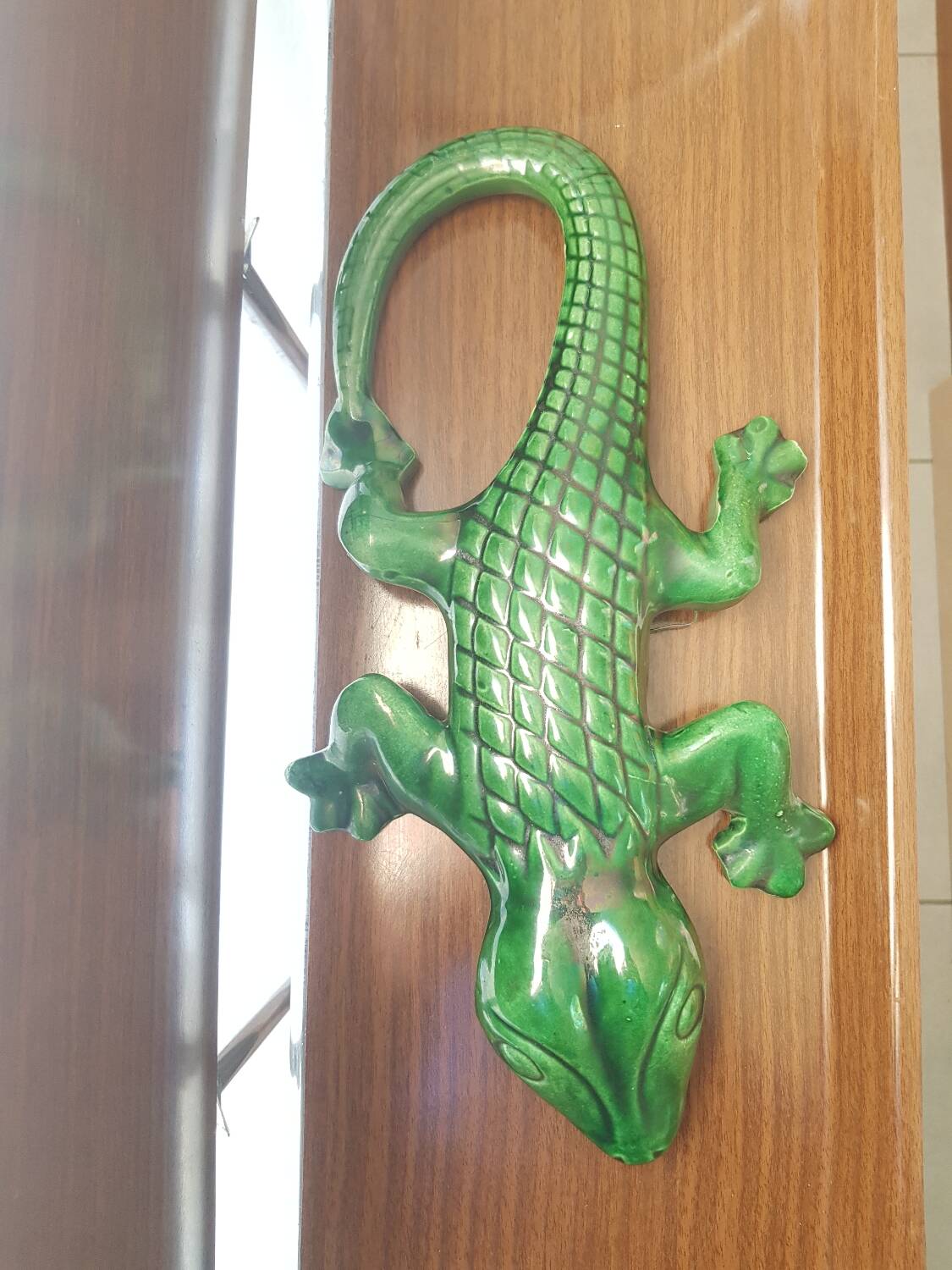 Green ceramic lizard