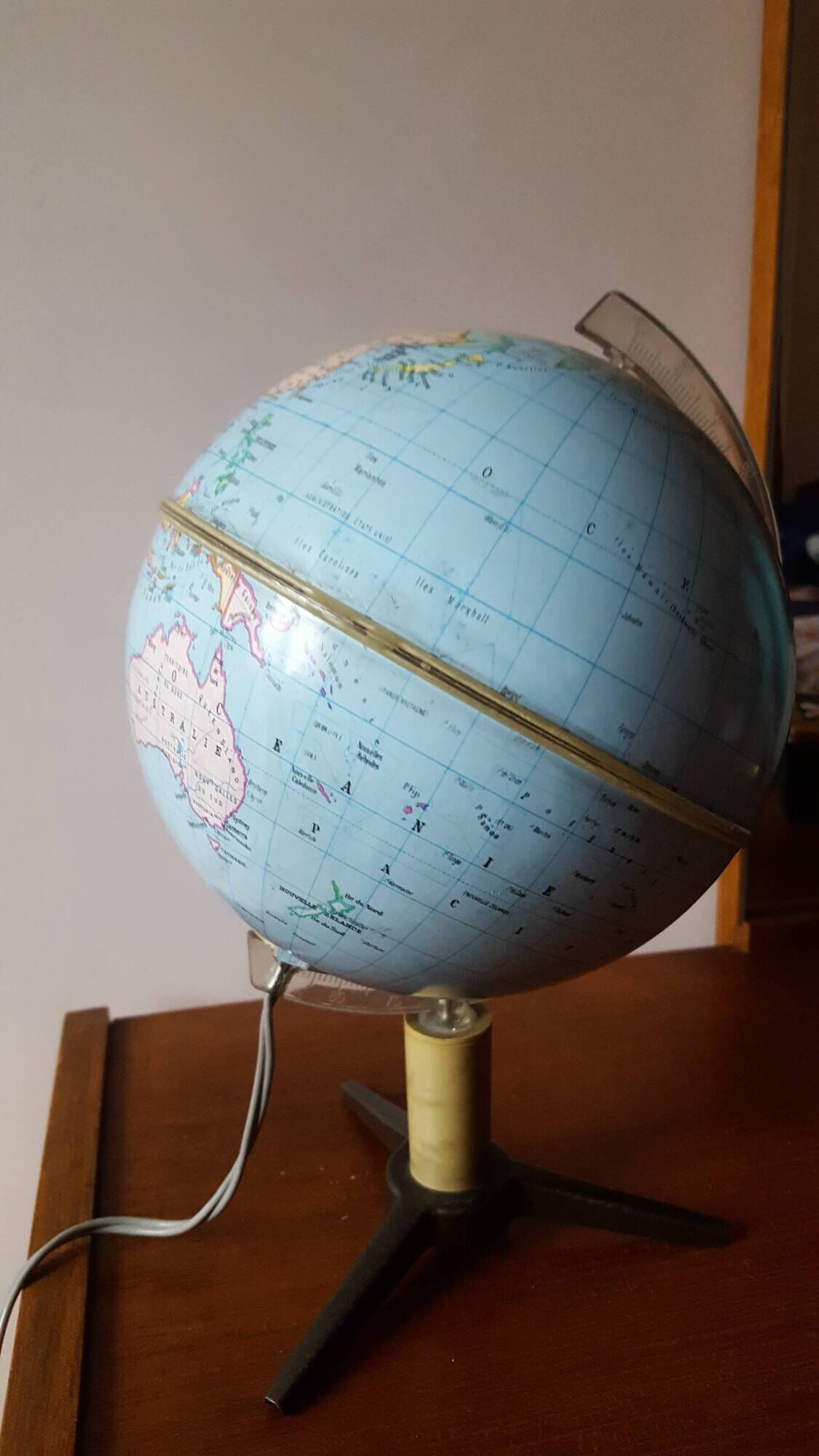 Bright vintage Earth globe brand Vulliermes with metal tripod foot