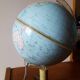 Bright vintage Earth globe brand Vulliermes with metal tripod foot
