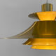 Golden colored aluminum pendant light from Frandsen Lighting. Denmark 1970s