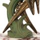 Art Deco pair of bookends with metal parrots and a marble base.