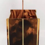 Tortoiseshell lucite magazine rack, Christian Dior Home collection, 1970.