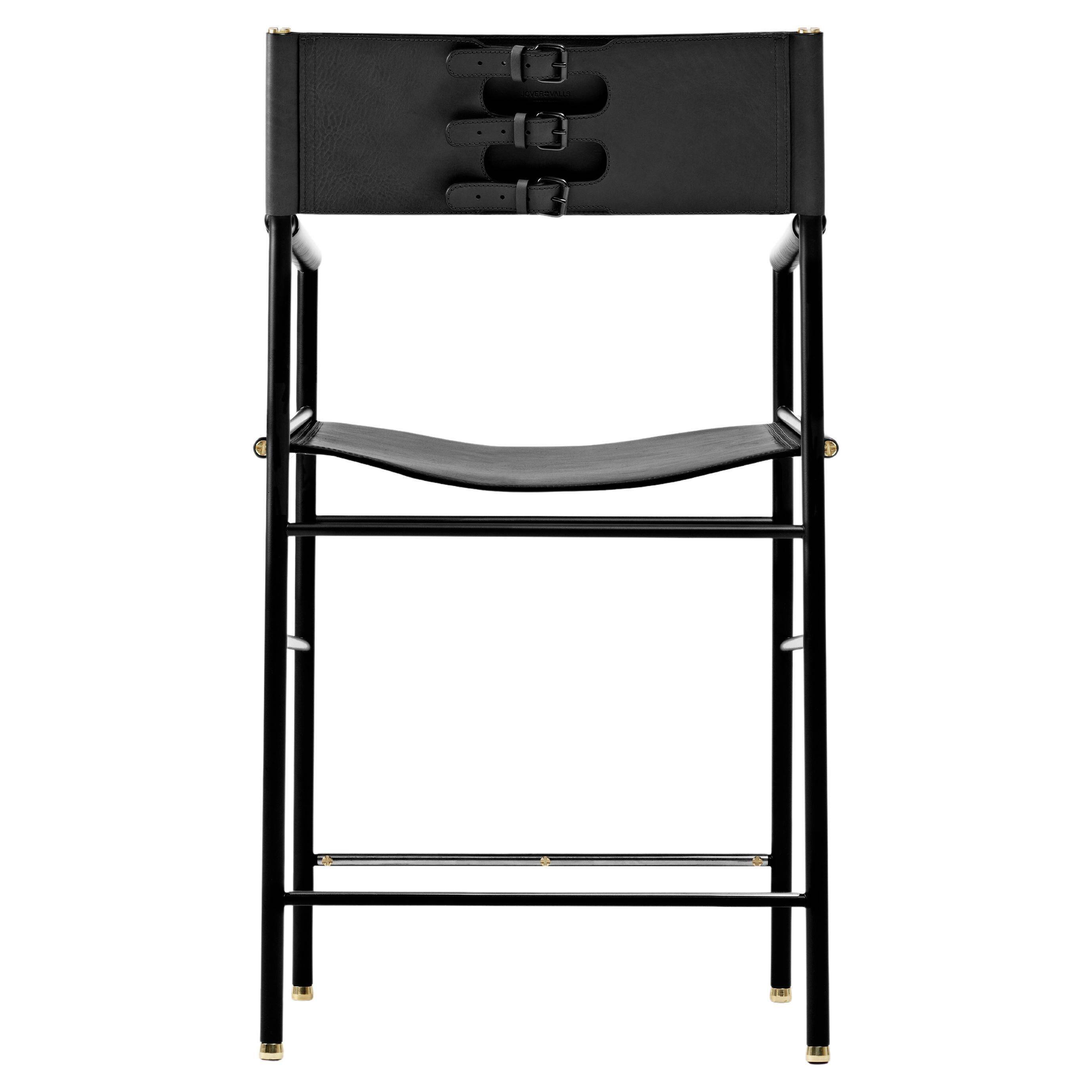 Contemporary bar stool with a black metal backrest and black rubber.