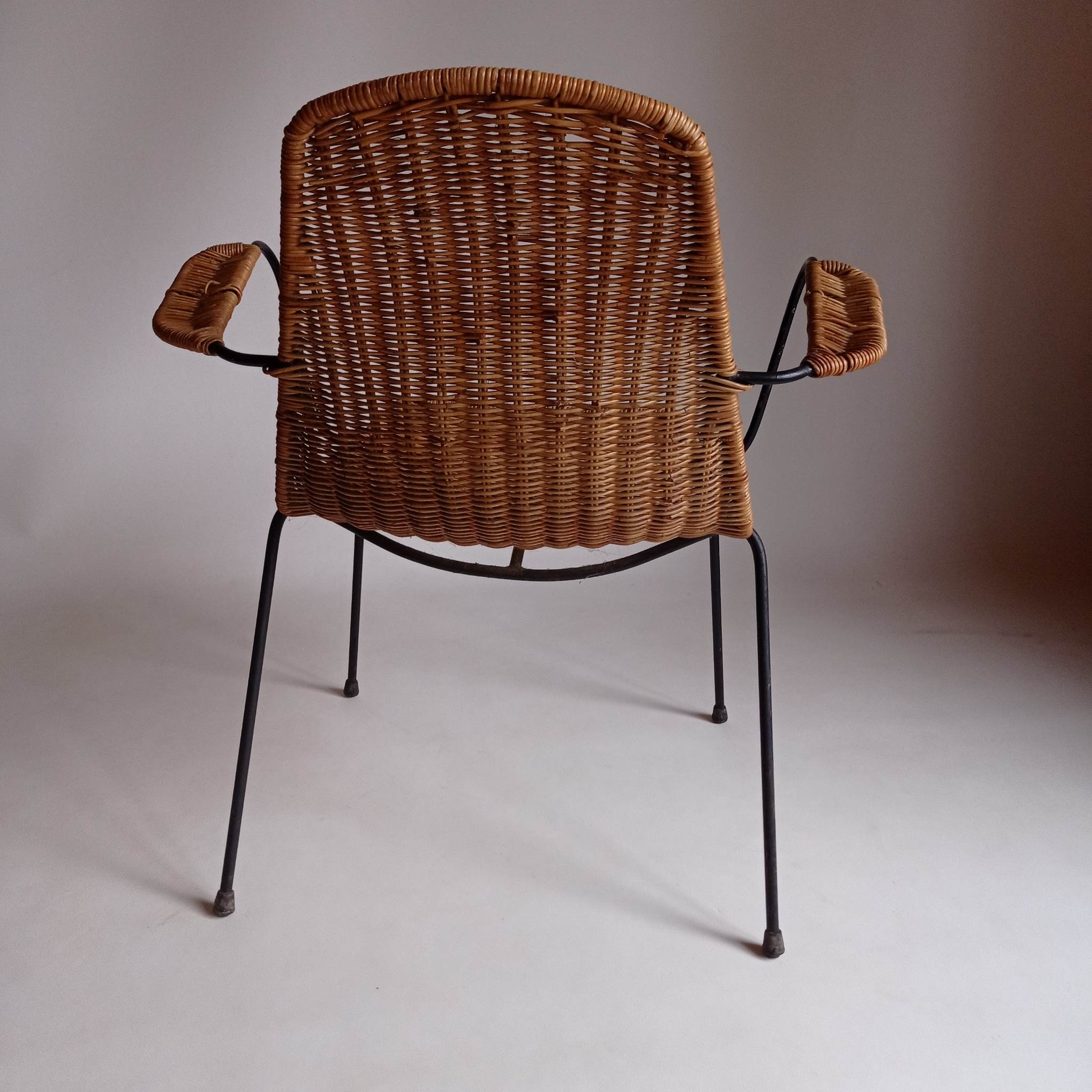 Wicker chair with Campo and Graffi armrests from the 60s.
