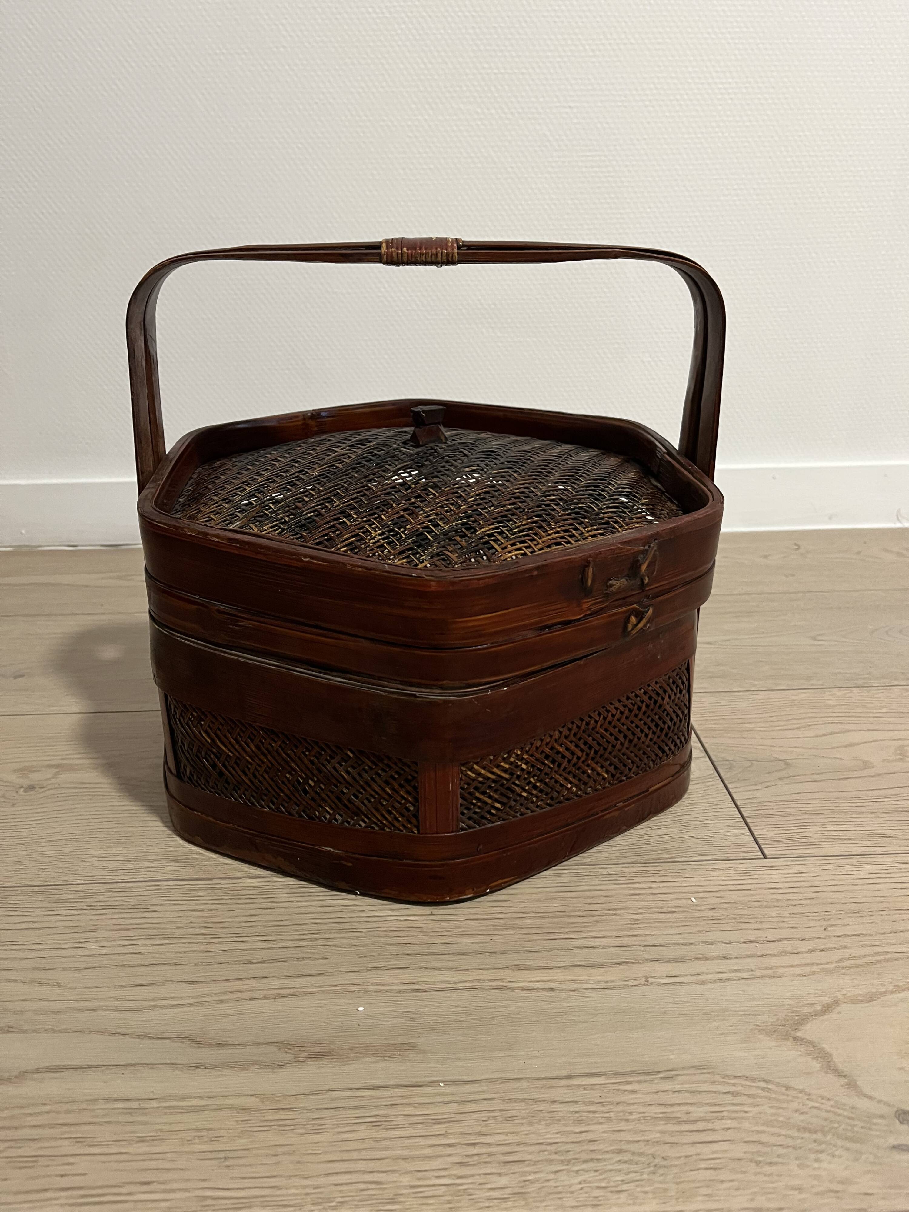 Ancient wooden and woven wicker basket,