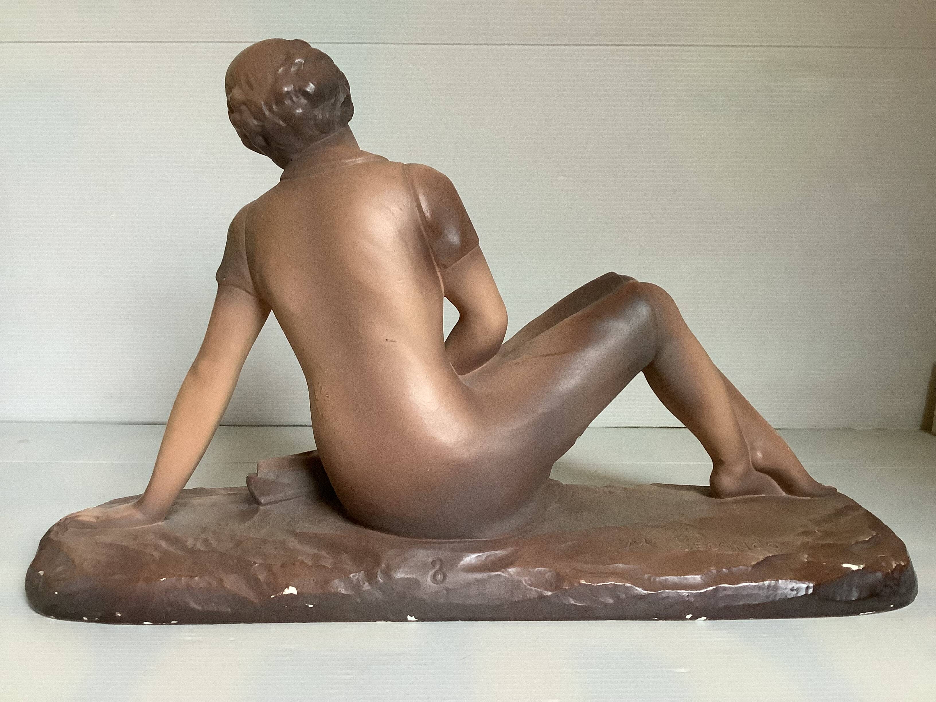 Art Deco statue of the woman with birds