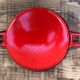 Round dish in red enamel