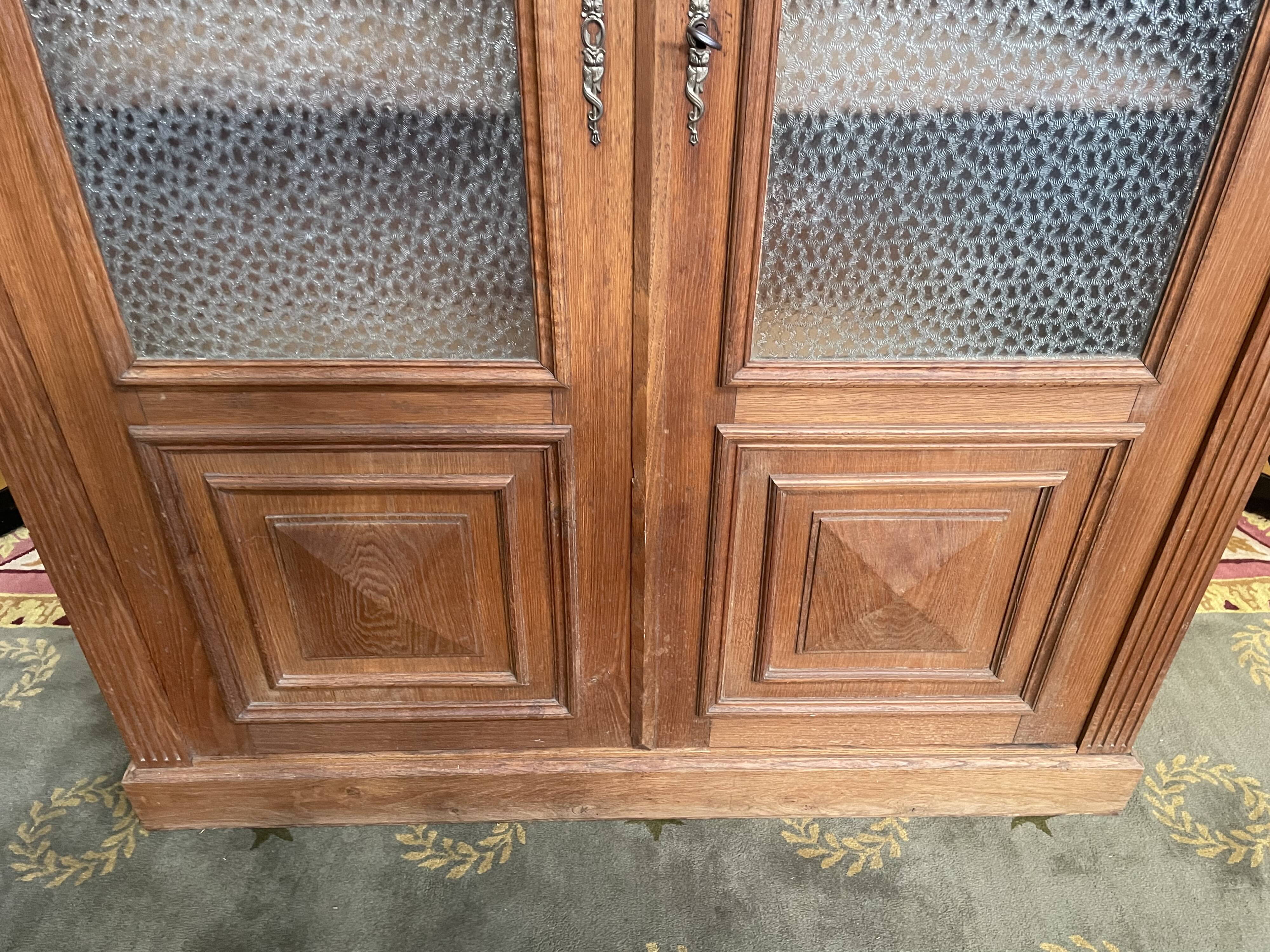 Glass library in solid oak 1900