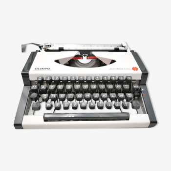 Machine à écrire olympia traveller de luxe blanche vintage révisée ruban neuf