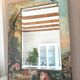 Very large mirror painted in Victorian style.