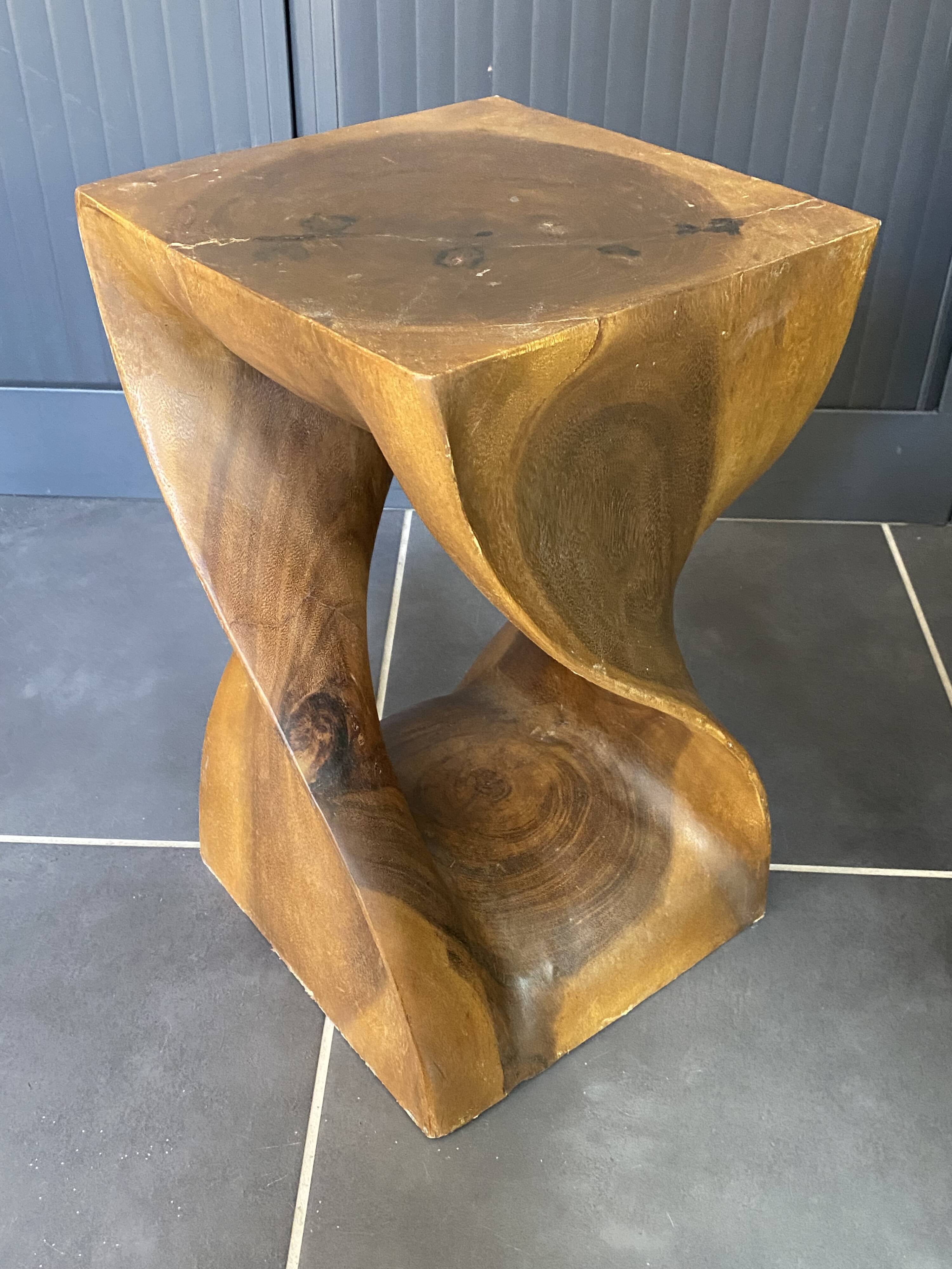 Stool n2 in solid raw walnut wood carved from the mass 1970