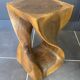 Stool n2 in solid raw walnut wood carved from the mass 1970