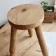 Vintage tripod stool in light raw wood