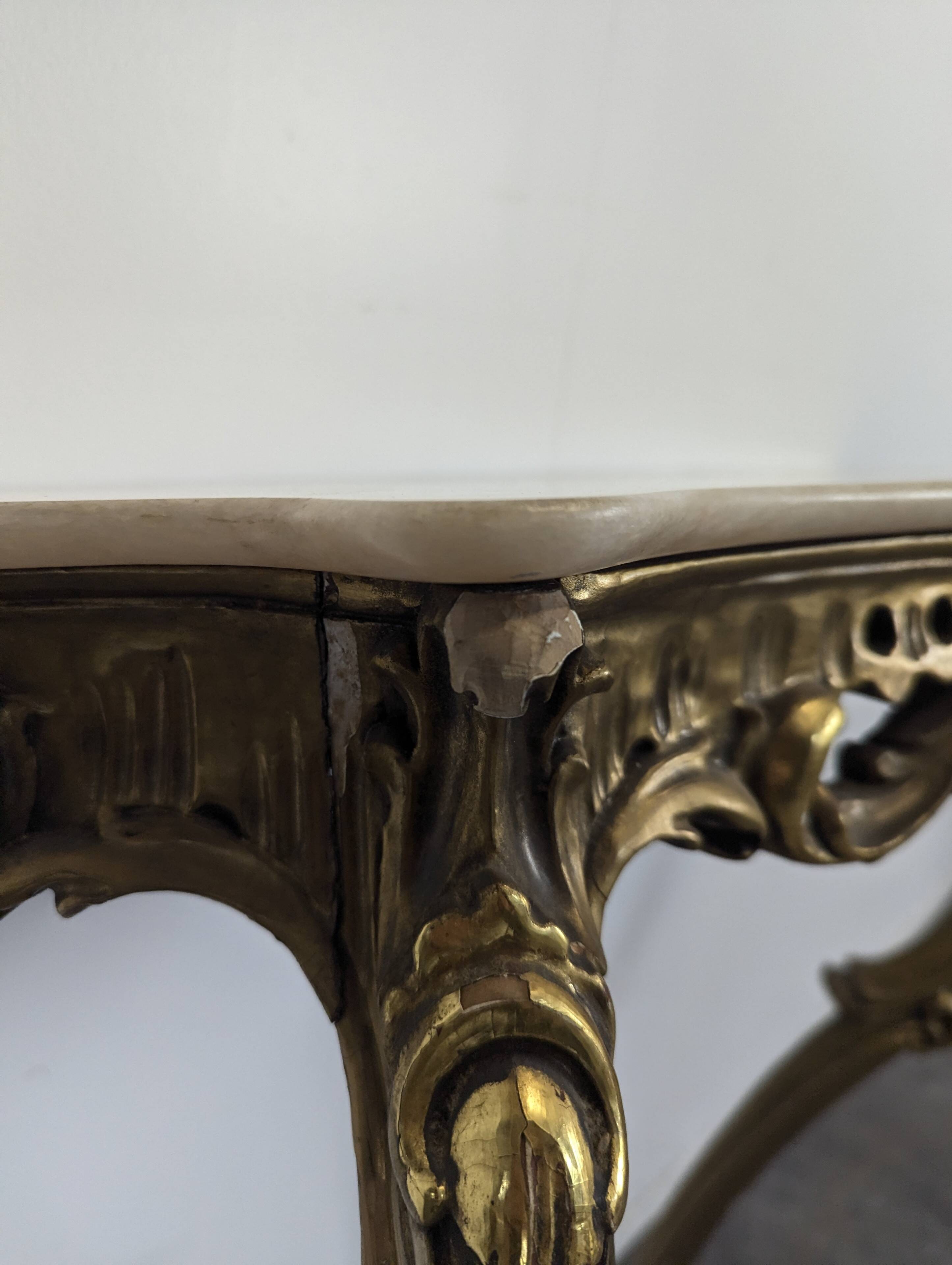 Golden wooden console in Louis XV style