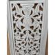 Decorative wooden panel with carved and openwork design.
