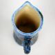 Small jug by Jacques Blin in blue ceramic with engraved animal decoration.