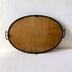 Vintage oval plateau in moulded resin and hammered metal, signed Datty.