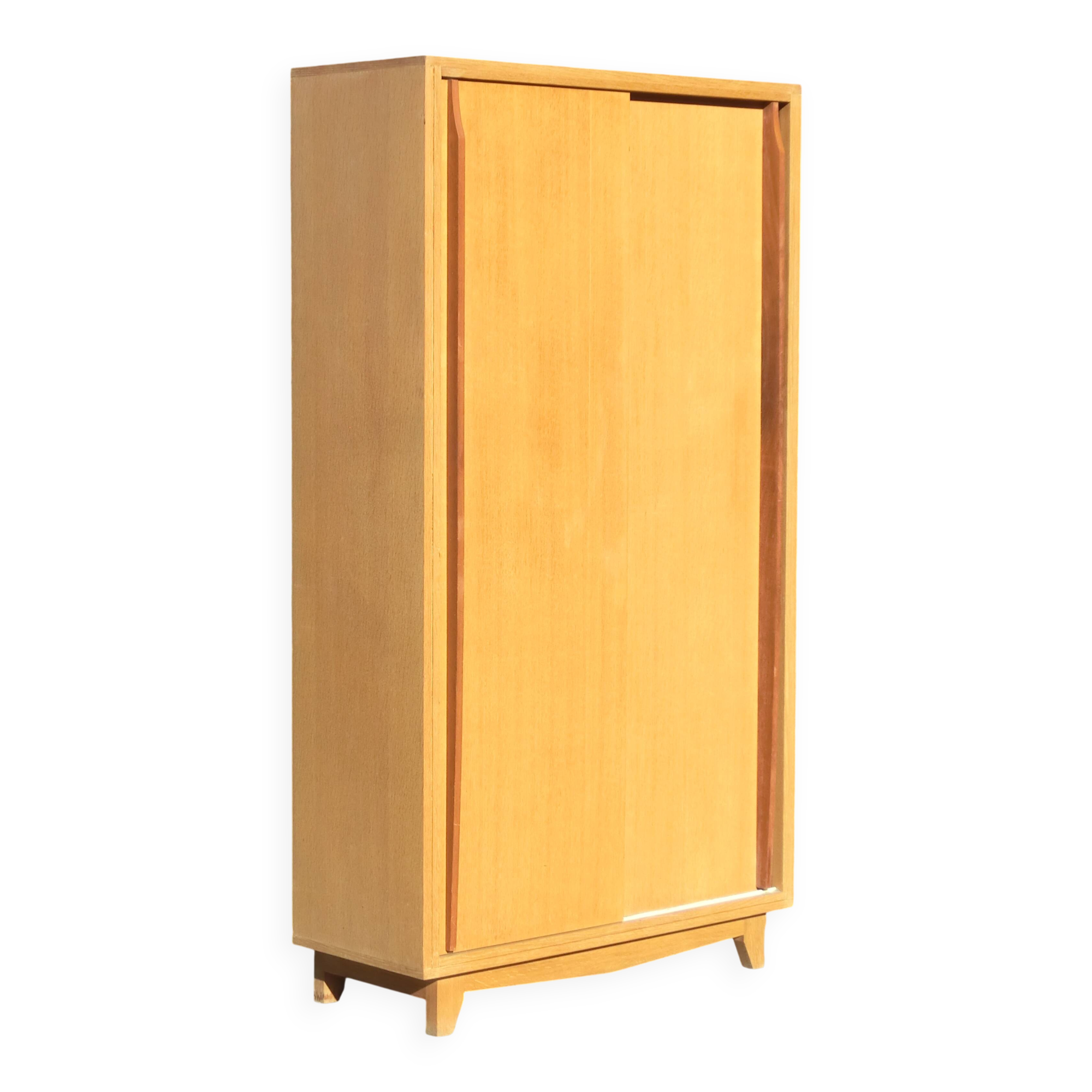 Small Scandinavian wardrobe with sliding doors - 1 side for hanging clothes.
