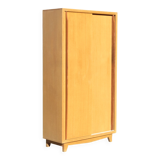 Small Scandinavian wardrobe with sliding doors - 1 side for hanging clothes.