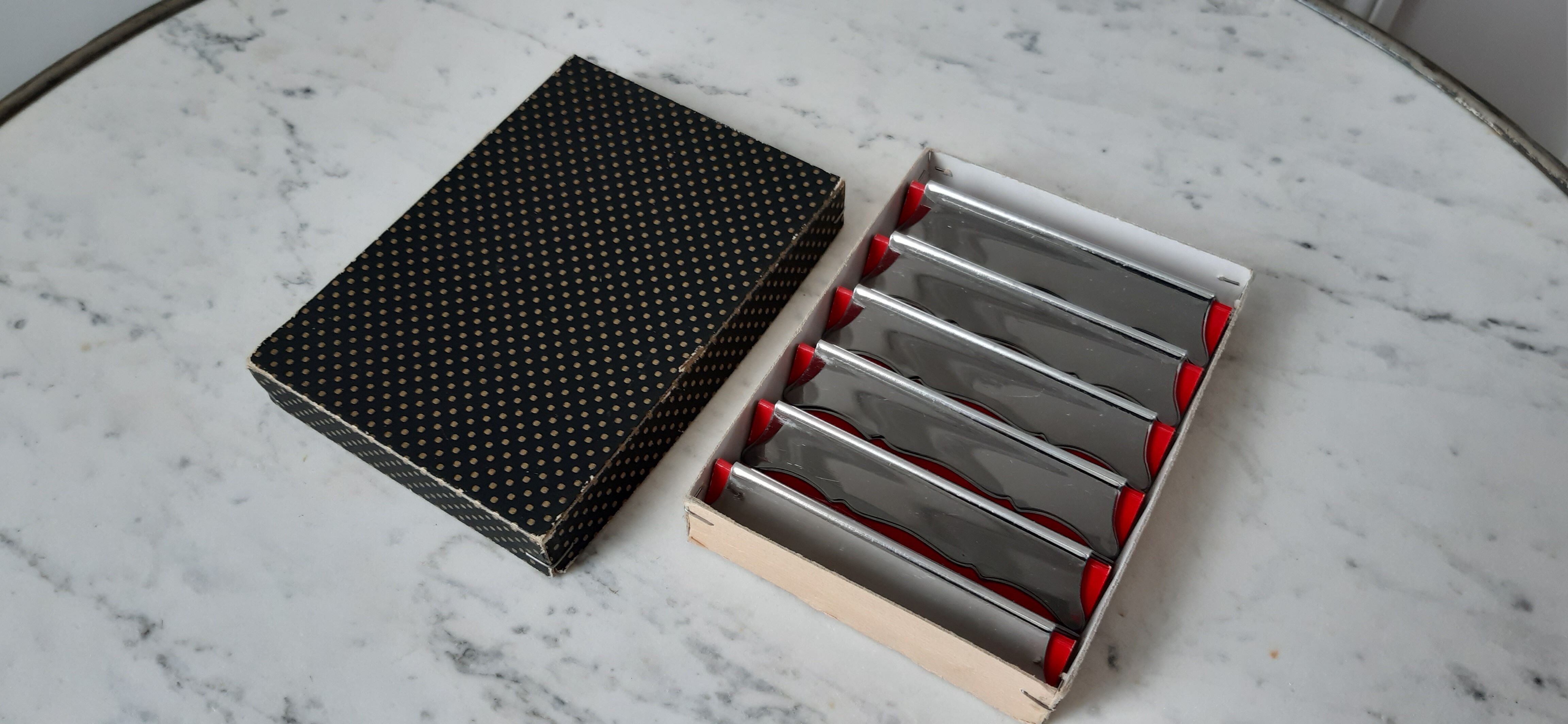Set of 12 steel knife holders 50s