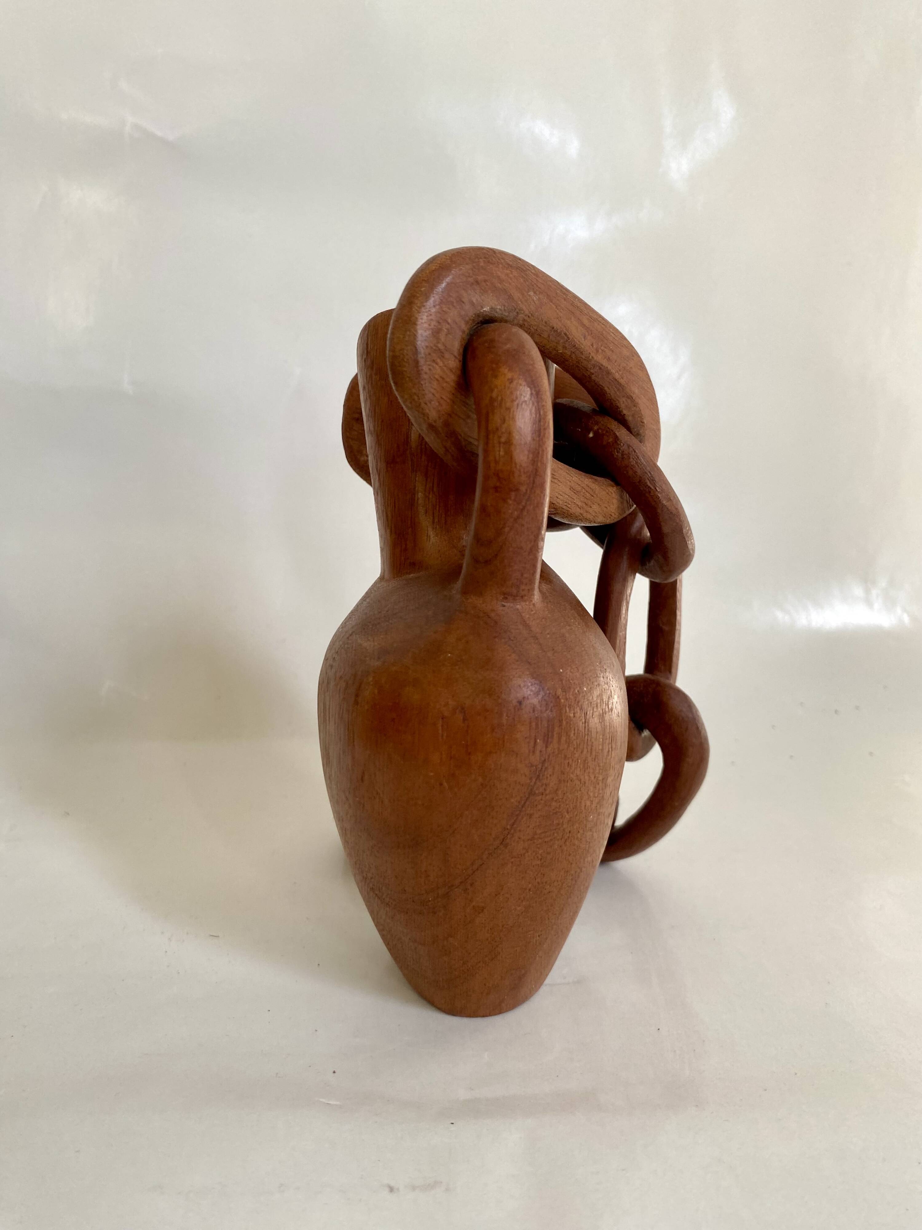 Vase and wooden chain to hang