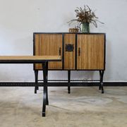 Dining table in rattan and wrought iron similar to Audoux & Minet.