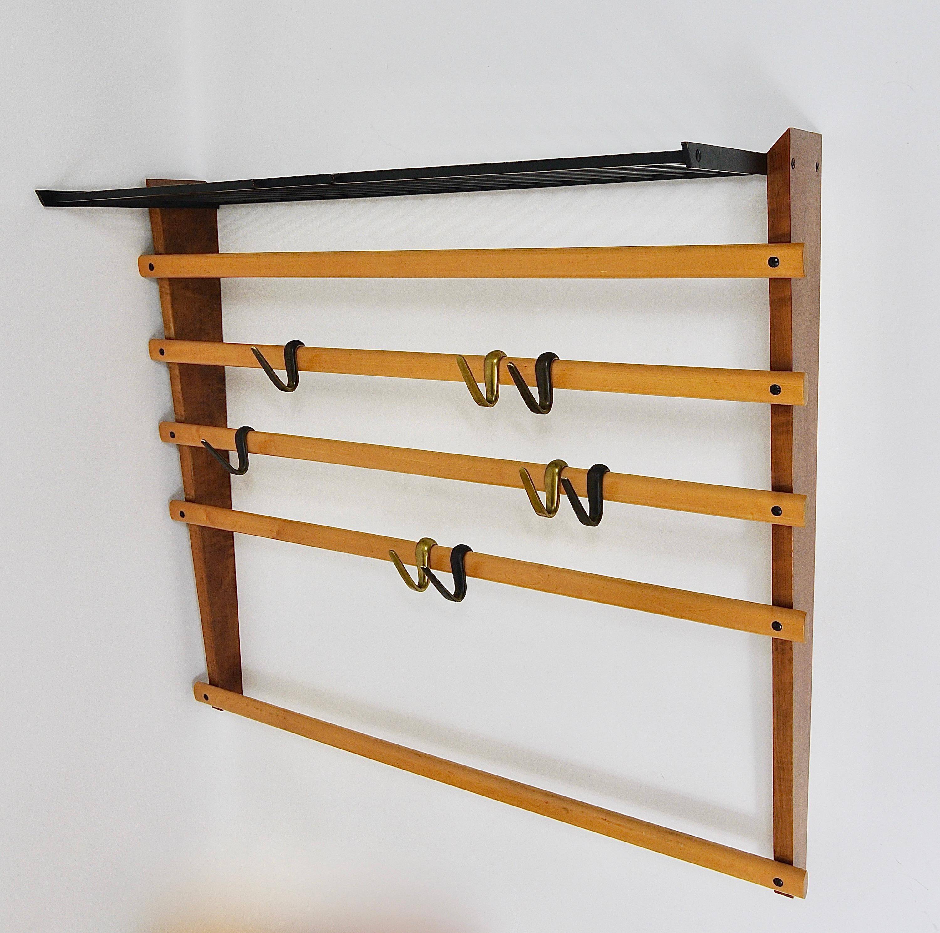 Rare coat rack by Carl Auböck with hat rack, cabinet, brass, walnut and beech, 1950s.
