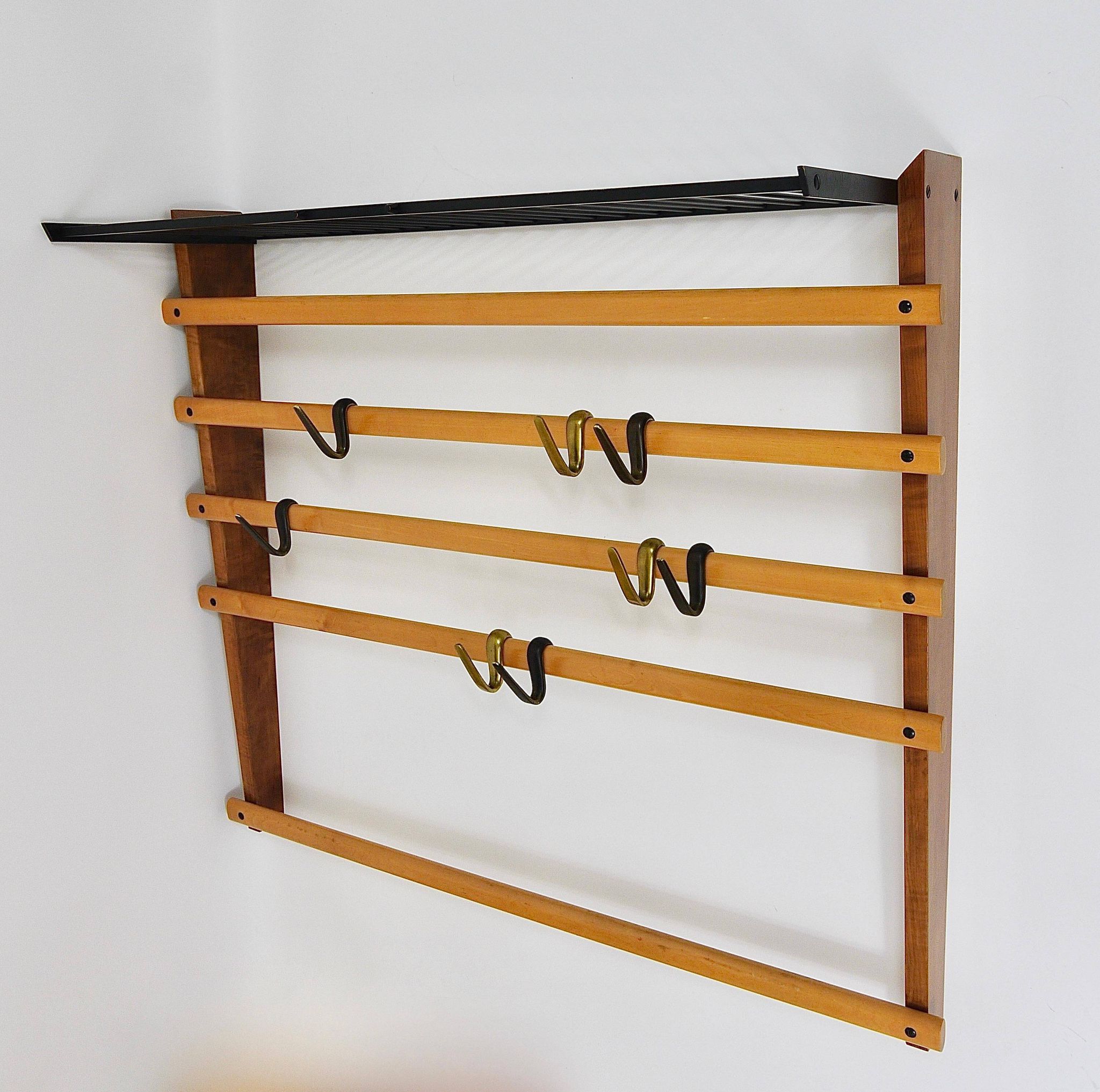 Rare coat rack by Carl Auböck with hat rack, cabinet, brass, walnut and beech, 1950s.