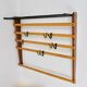 Rare coat rack by Carl Auböck with hat rack, cabinet, brass, walnut and beech, 1950s.
