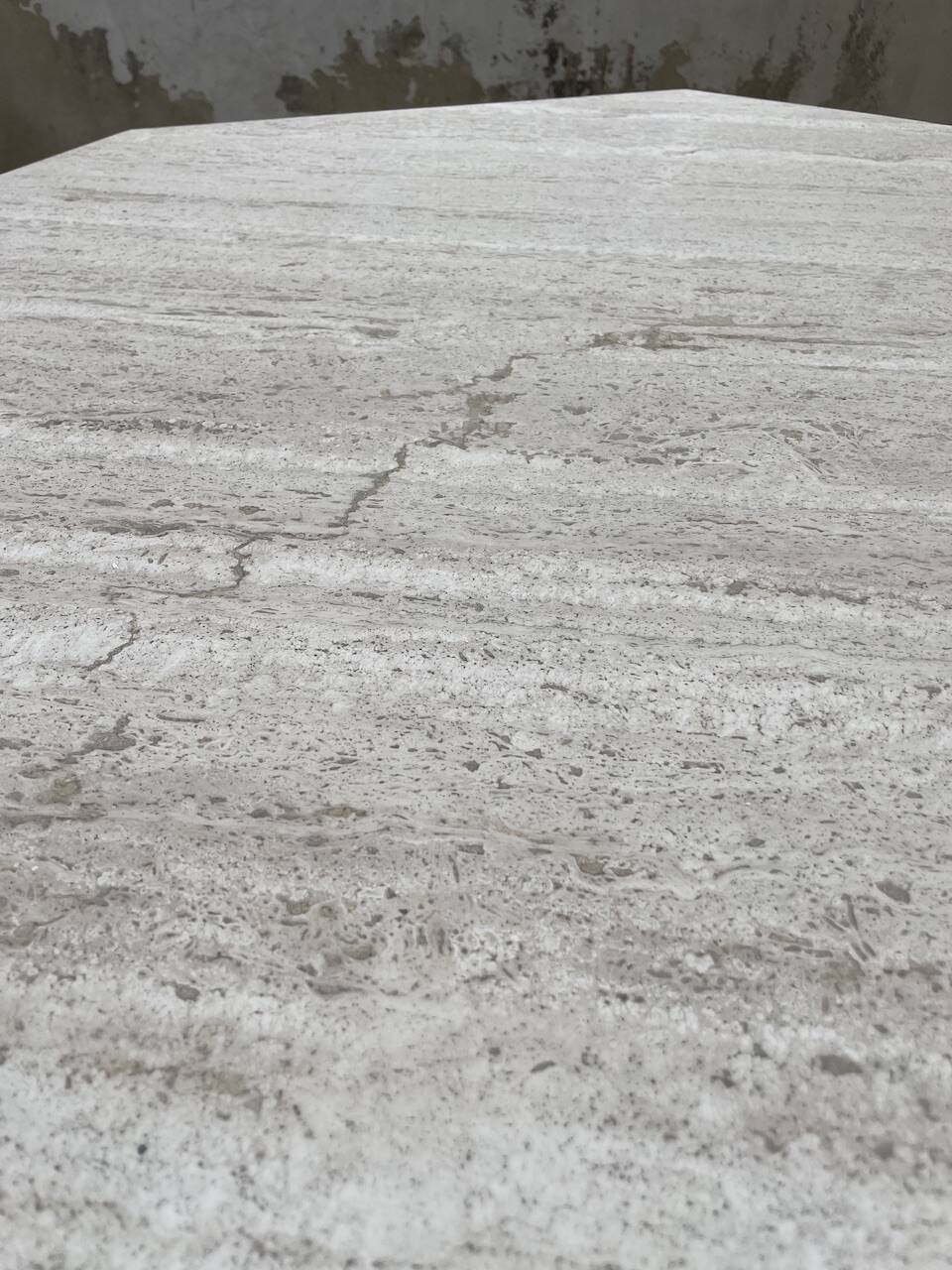 Octagonal travertine coffee table