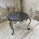 Table basse rené drouet métal et marbre noir