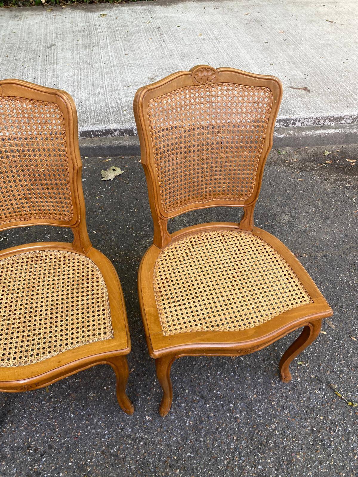 4 Louis XV dining chairs in light solid wood with caning.