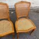 4 Louis XV dining chairs in light solid wood with caning.