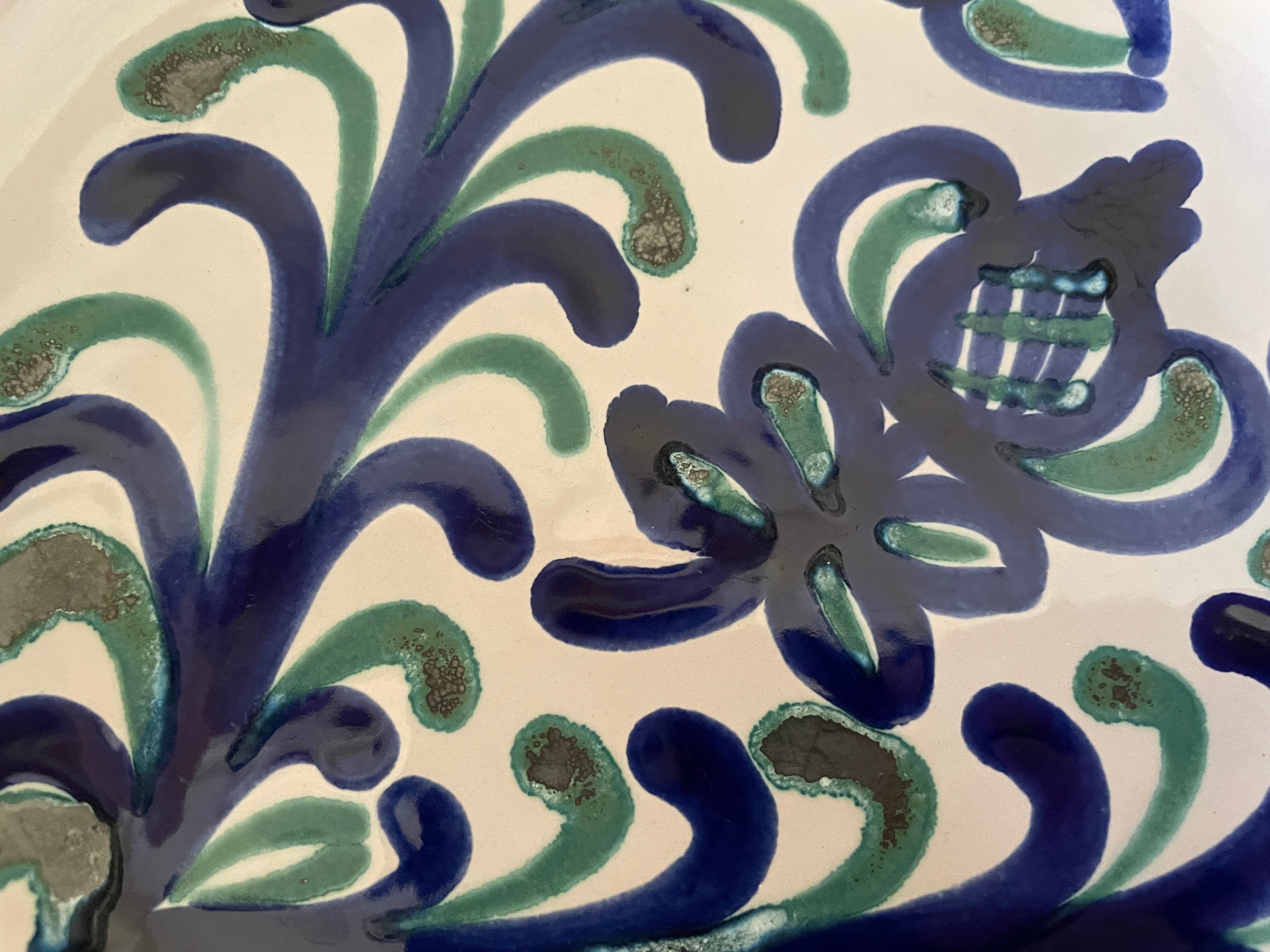 Hollow plate in ceramic from Granada.