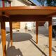 Round extendable teak dining table from the 60s