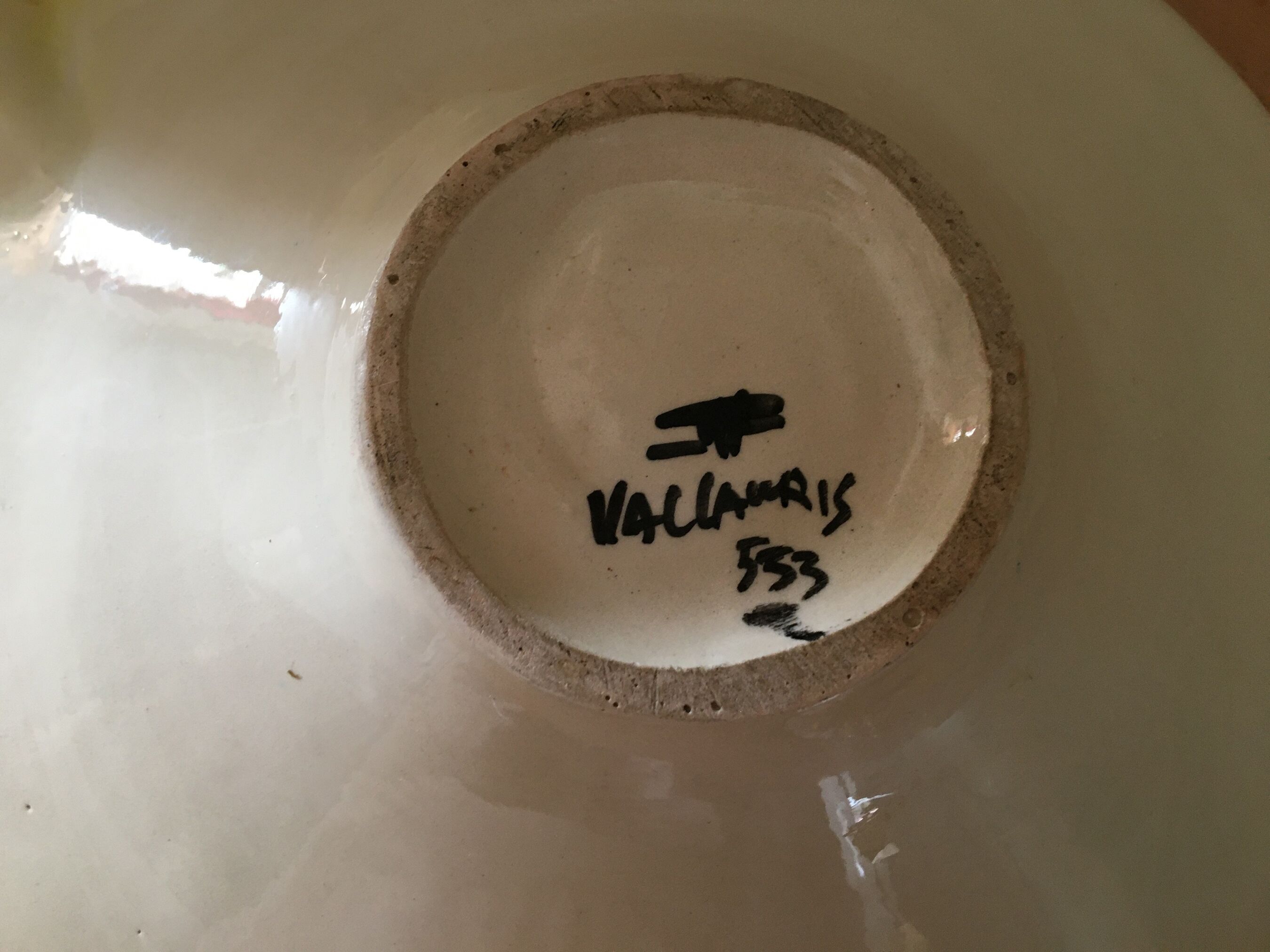 Old plate in ceramic (barbotine pottery) signed vallauris