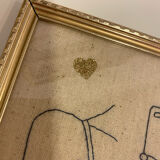Broderie encadrée