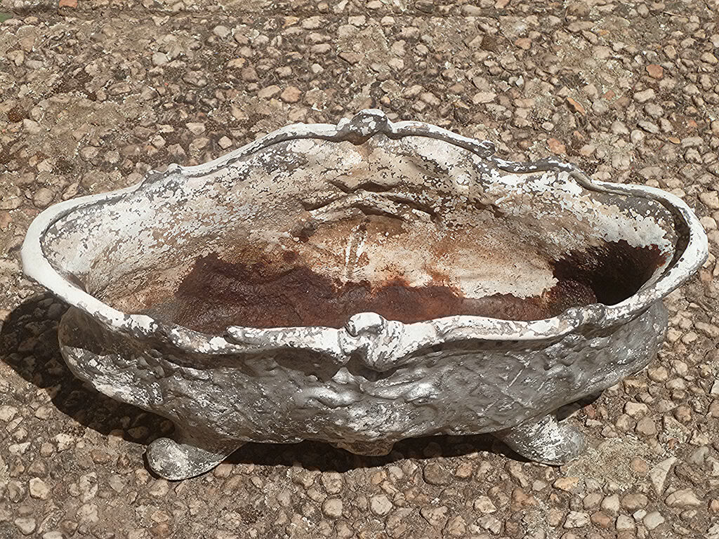 old cast iron planter