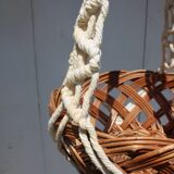 Hanging plant holders in macramé and rattan