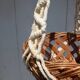 Hanging plant holders in macramé and rattan