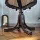 Vintage swivel office chair with curved wood and caning (Thonet style)