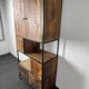 Antique wooden cabinet with black metal structure