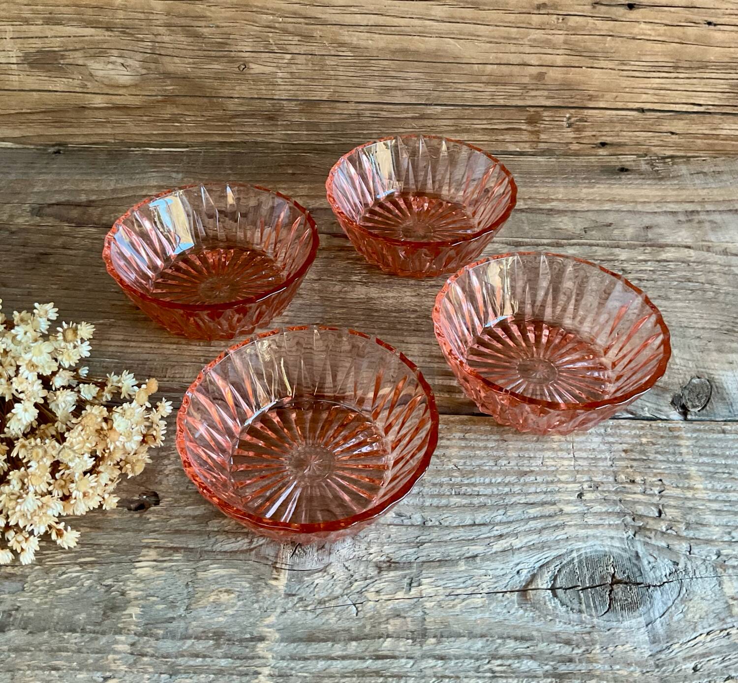 4 pink glass bowls