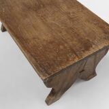 Small rustic wooden stool with curved base, France ca. 1900
