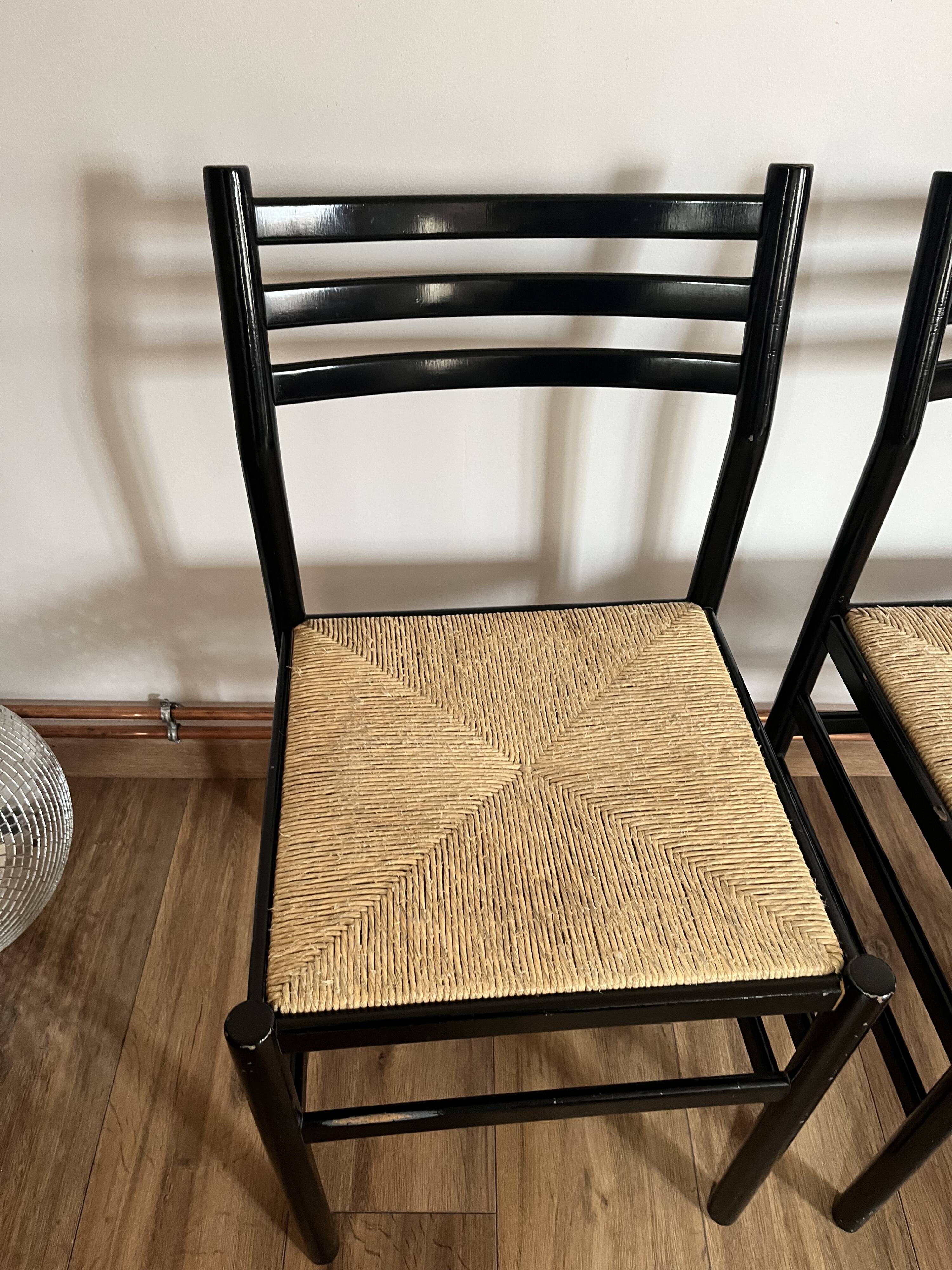 Set of 4 Italian black chairs 1970s