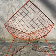 Orange lattice armchair