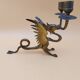 Pair of bronze candlesticks with chimera dragons